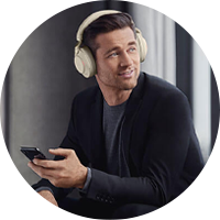 man using Jabra headset with his smartphone