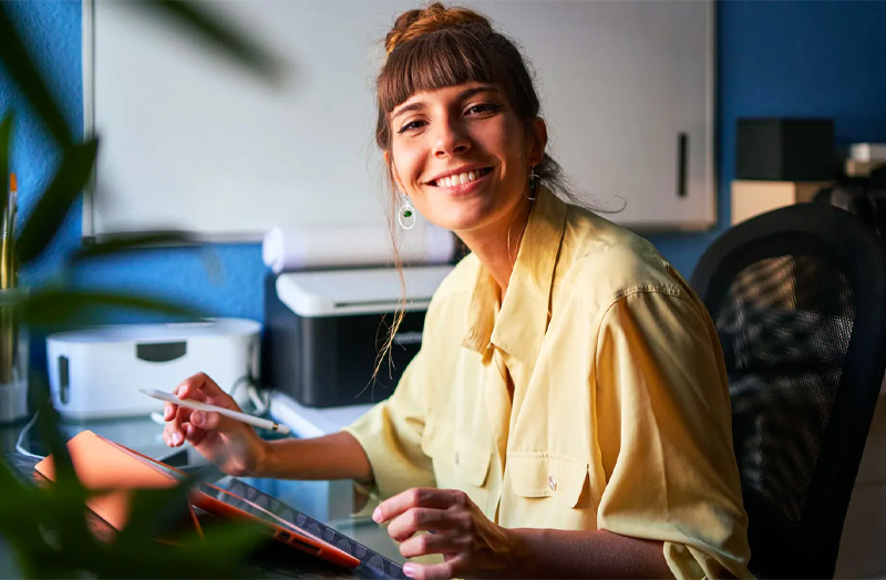 Woman smiling at a camera