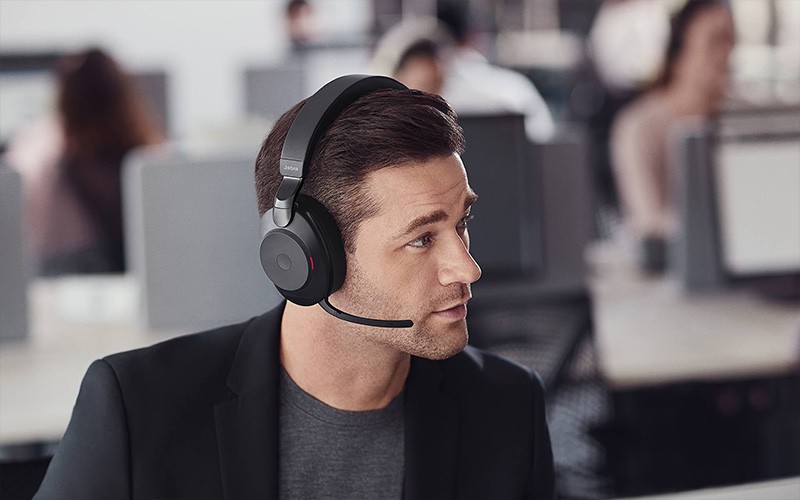 Man using the Evolve2 on a call