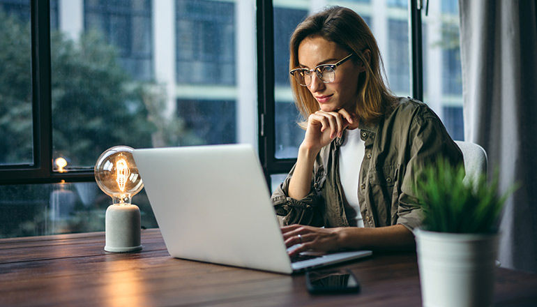 Solutions created to keep your business safe Casually dressed man working on a laptop