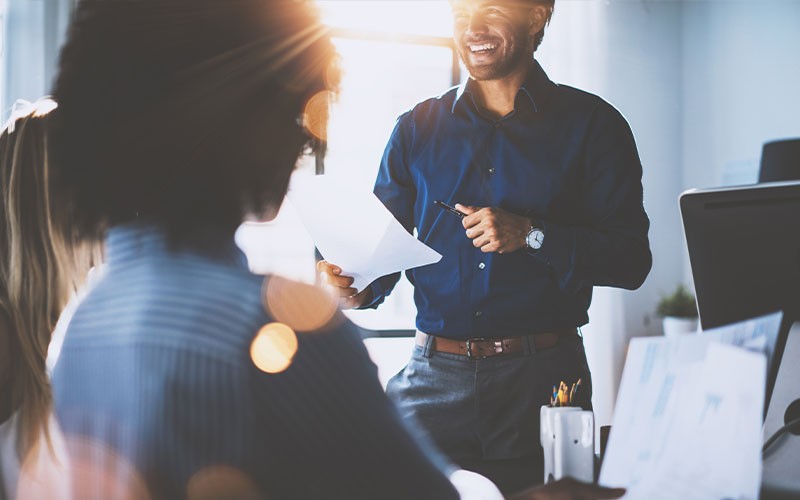 Man presenting to colleagues