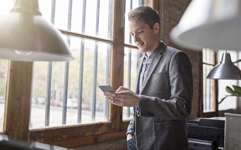 Business man using mobile phone